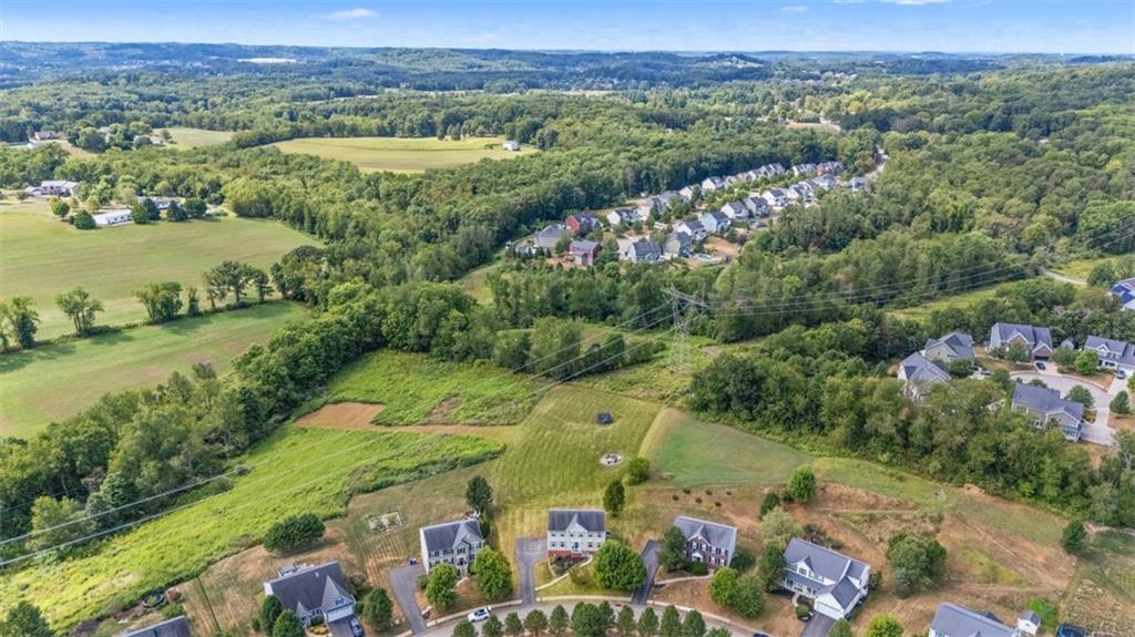 145 Brighton Lane Mars, PA 16046 - Photo 40 of 44 an aerial view of lake and residential houses with outdoor space