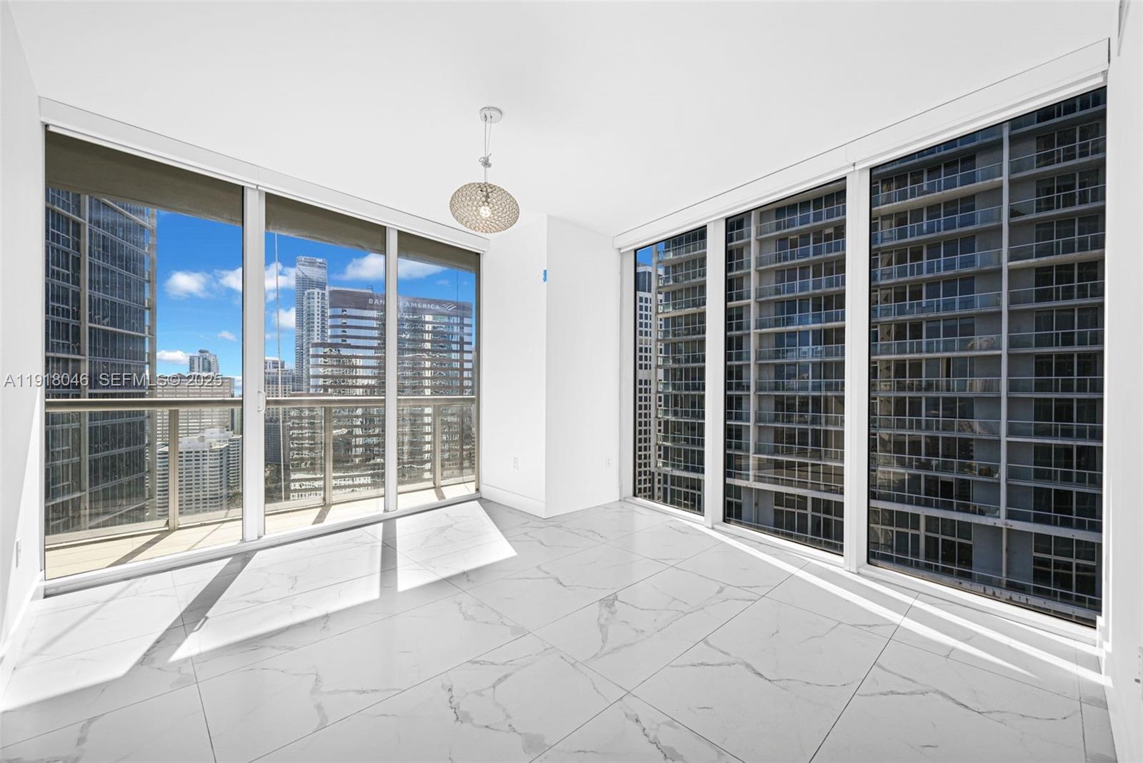 475 Brickell Avenue, Unit 3113 Miami, FL 33131 - Photo 8 of 28 a view of house with large windows