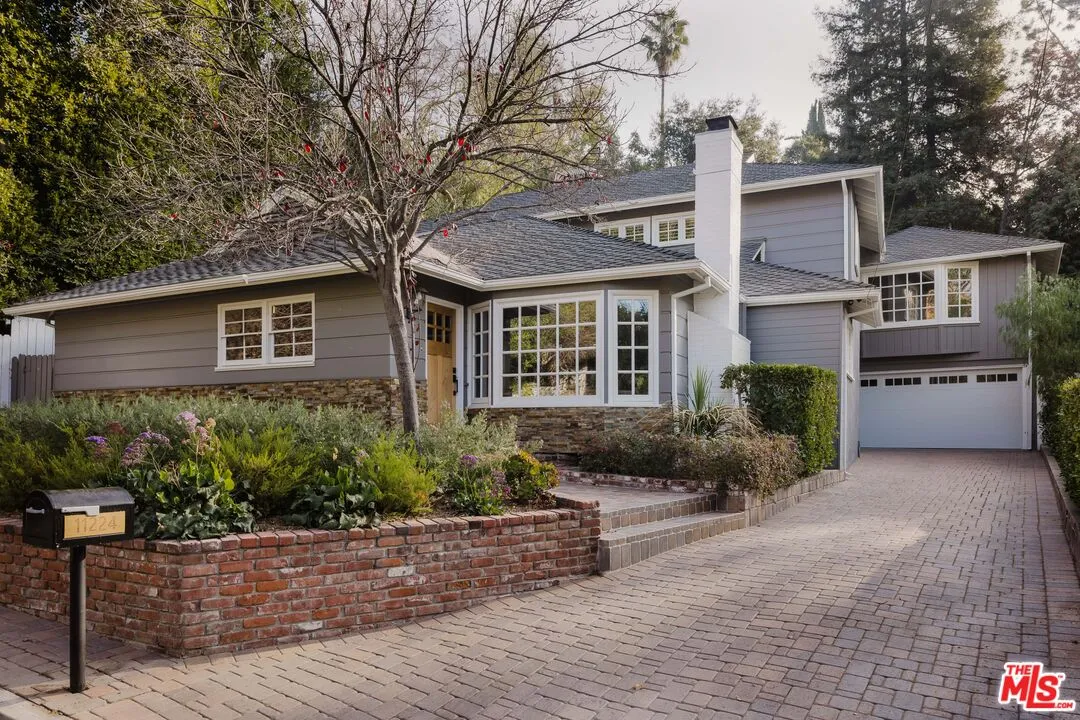 11224 Canton Drive Studio City, CA 91604 - Photo 1 of 1 a front view of a house with a garden