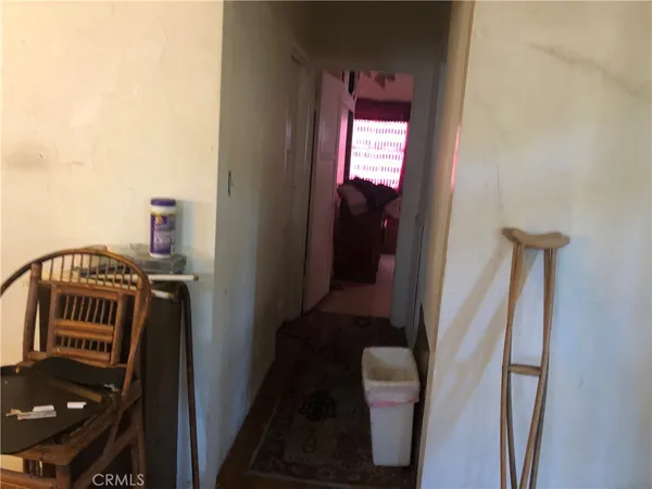 a kitchen with a refrigerator and a stove