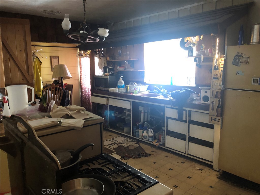 7115 Shadygrove Street Tujunga, CA 91042 - Photo 14 of 25 a room with storage and utility