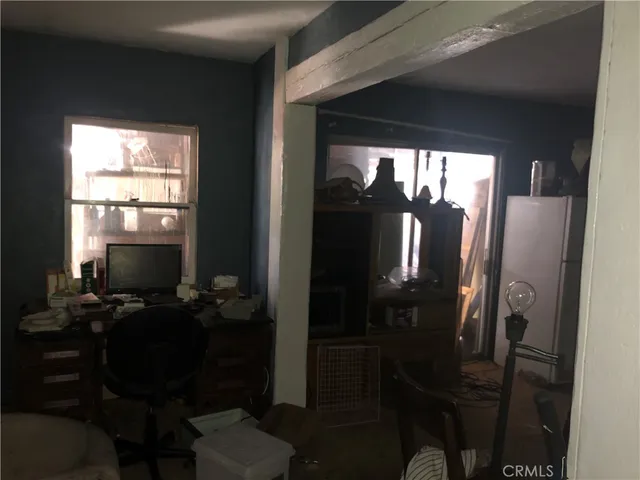 a balcony with a table and chairs