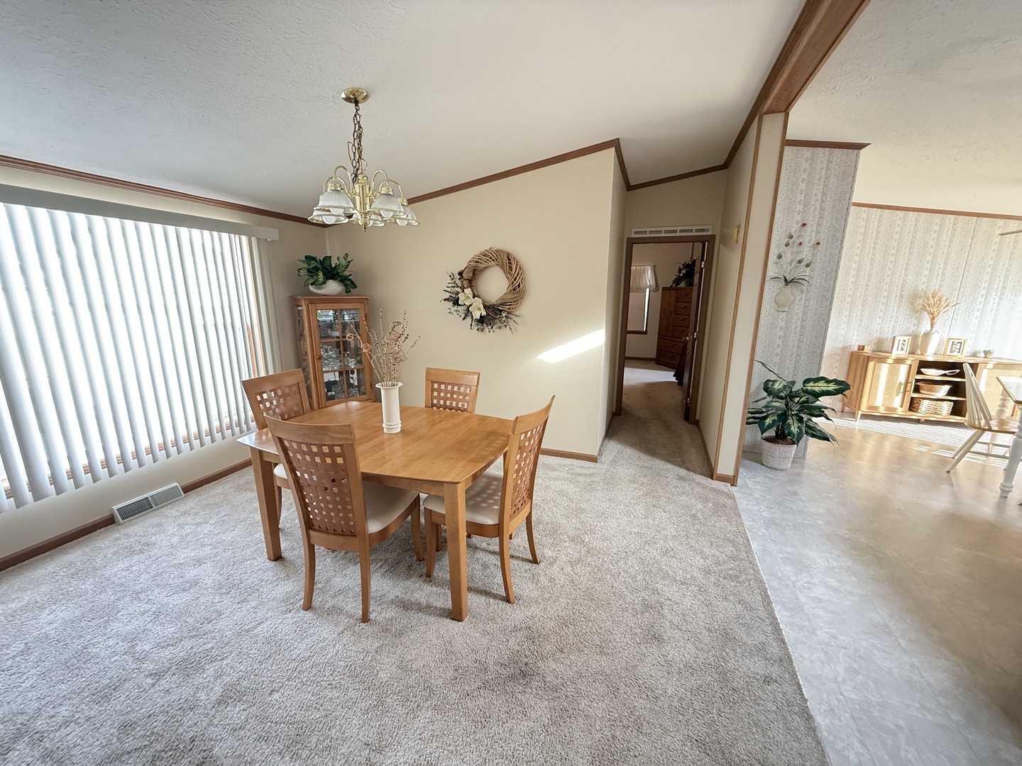 4 Cynthia Lane Beecher, IL 60401 - Photo 3 of 20 a view of a dining room with furniture window and wooden floor