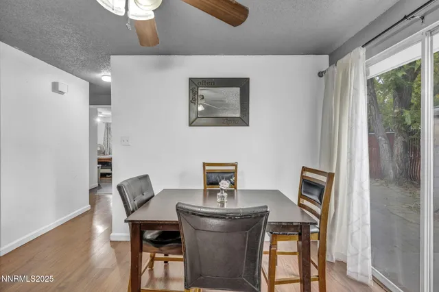 a workspace with furniture hardwood and a window