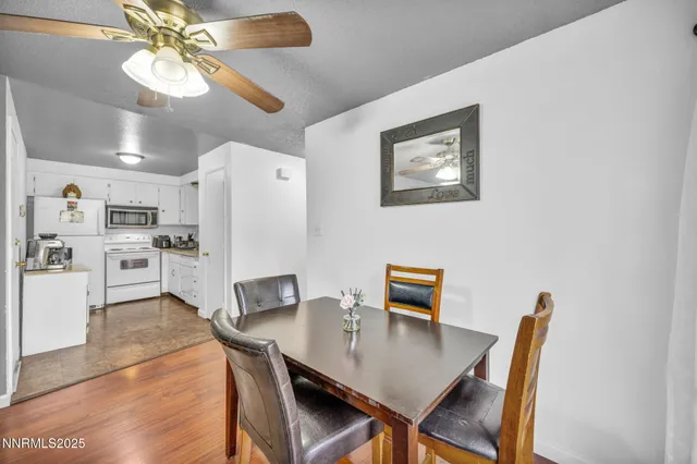 a kitchen with a sink a stove and cabinets