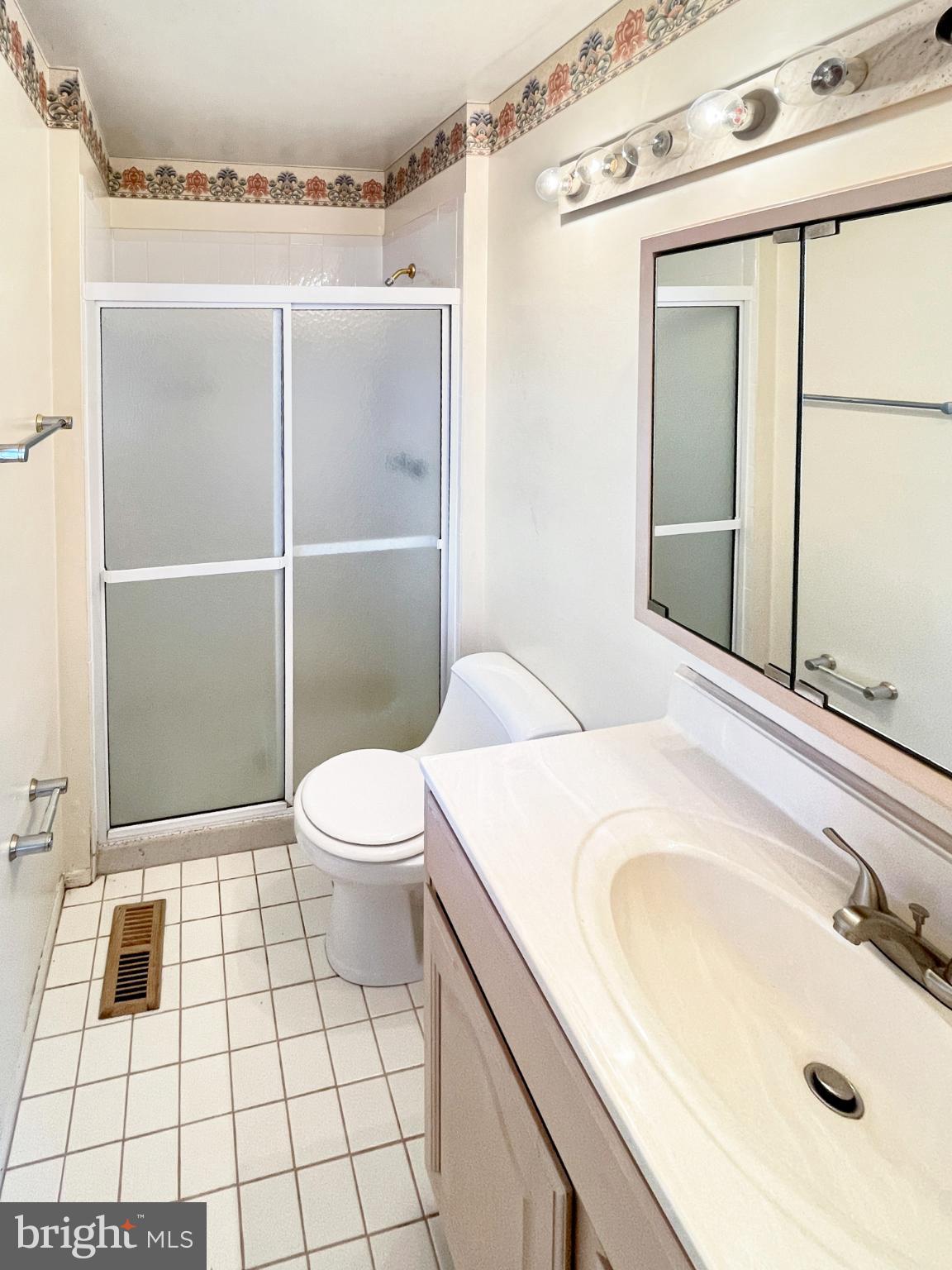 34 East River Drive Willingboro, NJ 08046 - Photo 13 of 15 a bathroom with a sink toilet and shower