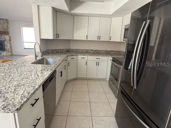 a close view of sink and microwave