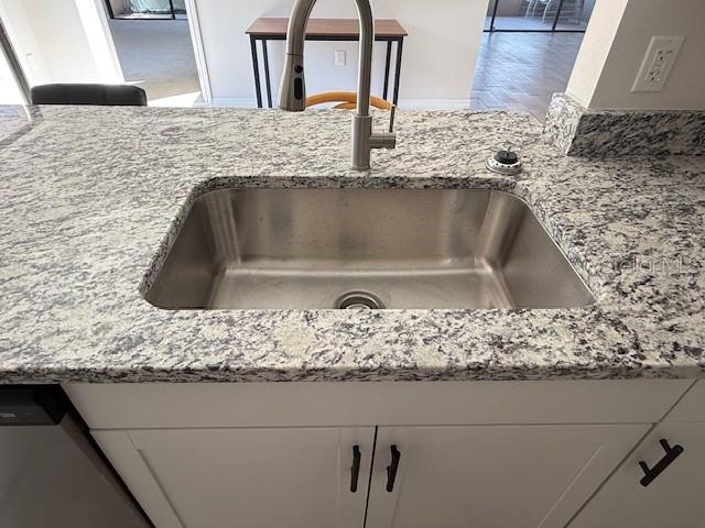 4513 Dewey Drive New Port Richey, FL 34652 - Photo 14 of 29 a close view of sink and microwave