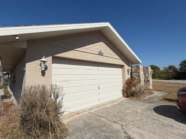 a view of garage and chair