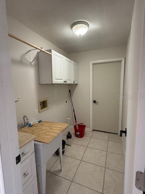 4513 Dewey Drive New Port Richey, FL 34652 - Photo 23 of 29 a room that has a lot of cabinets in it