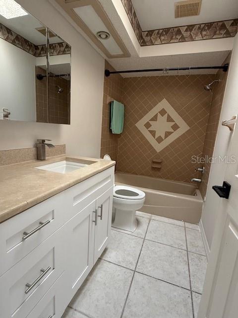 4513 Dewey Drive New Port Richey, FL 34652 - Photo 24 of 29 a bathroom with a granite countertop sink a toilet and a mirror