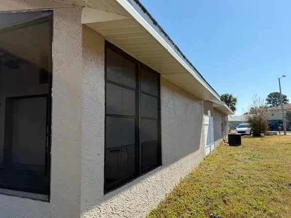 a view of a backyard of the house