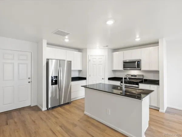 $410,000 | 21256 East 65th Drive, Aurora, CO 80019