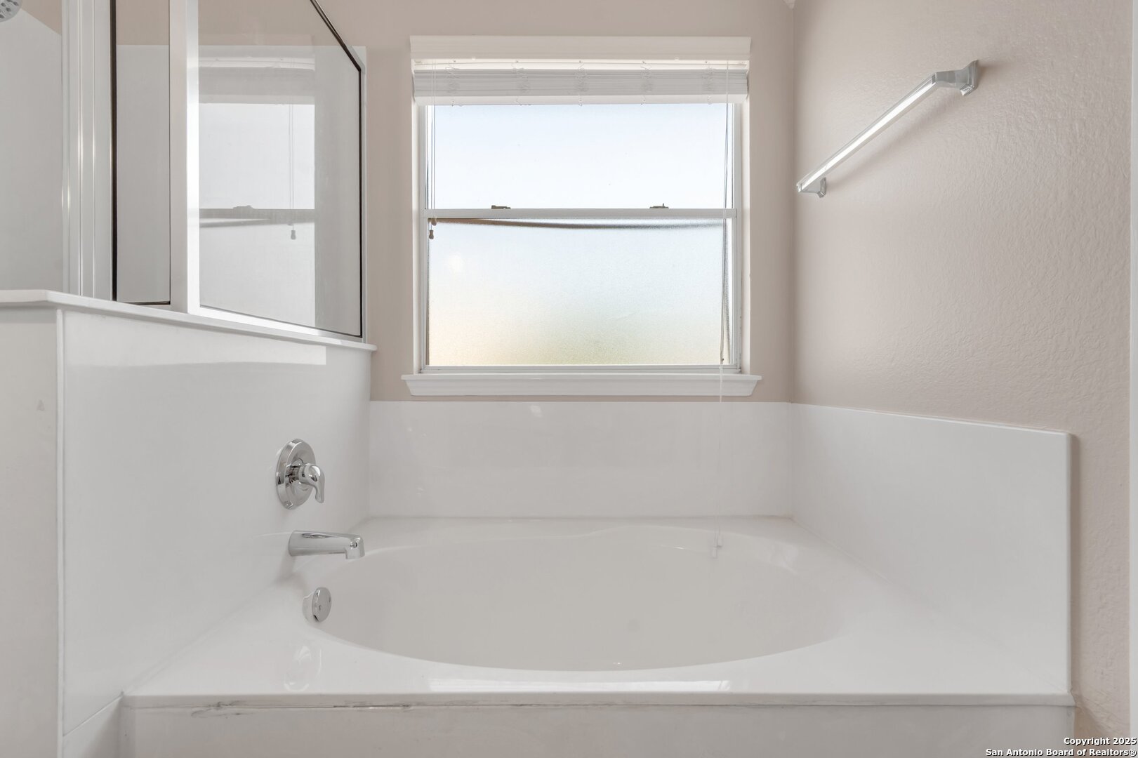5644 Brougham Way Austin, TX 78754 - Photo 13 of 31 a white bath tub sitting next to a window