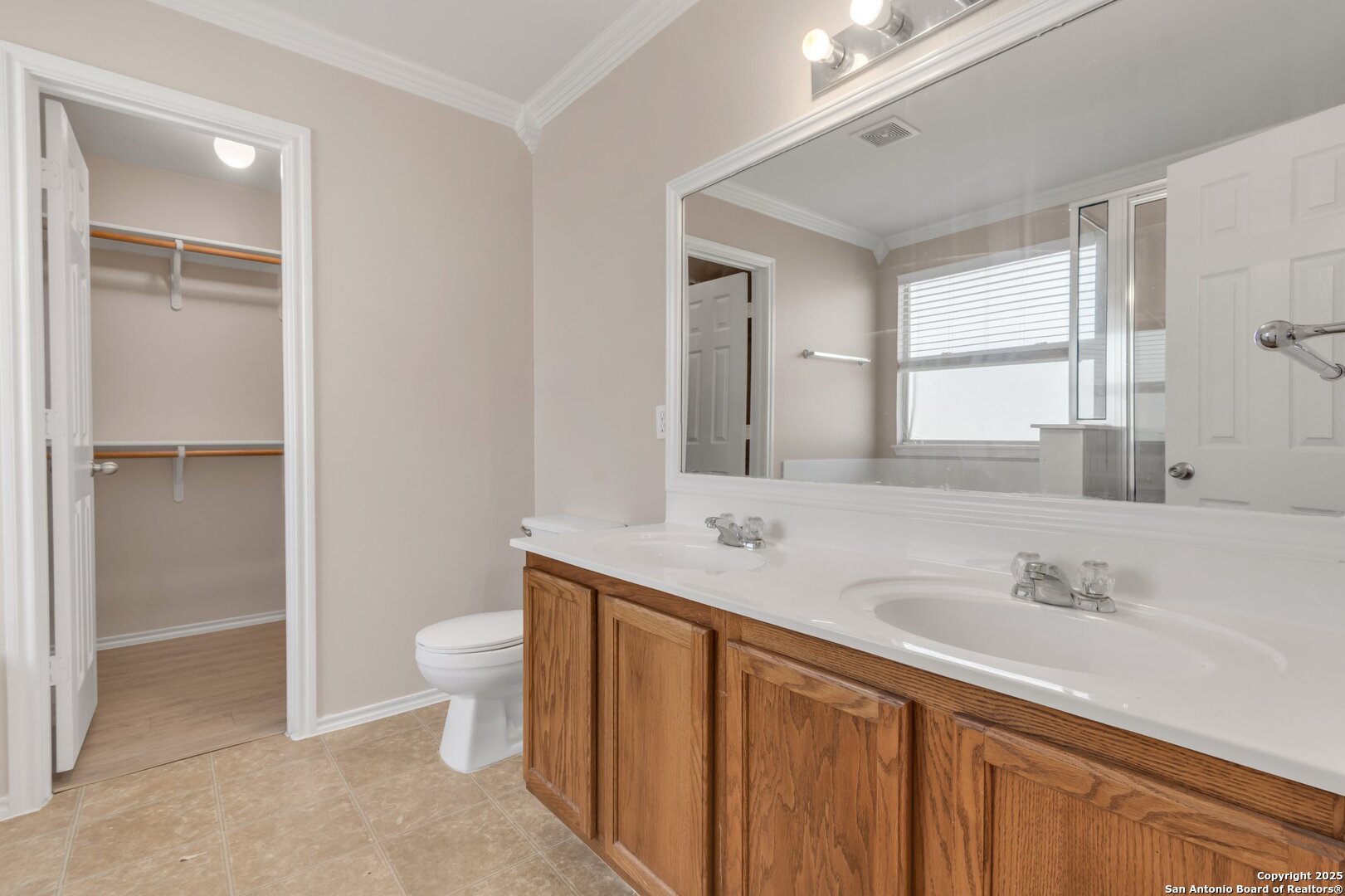 5644 Brougham Way Austin, TX 78754 - Photo 16 of 31 a bathroom with a sink and a mirror