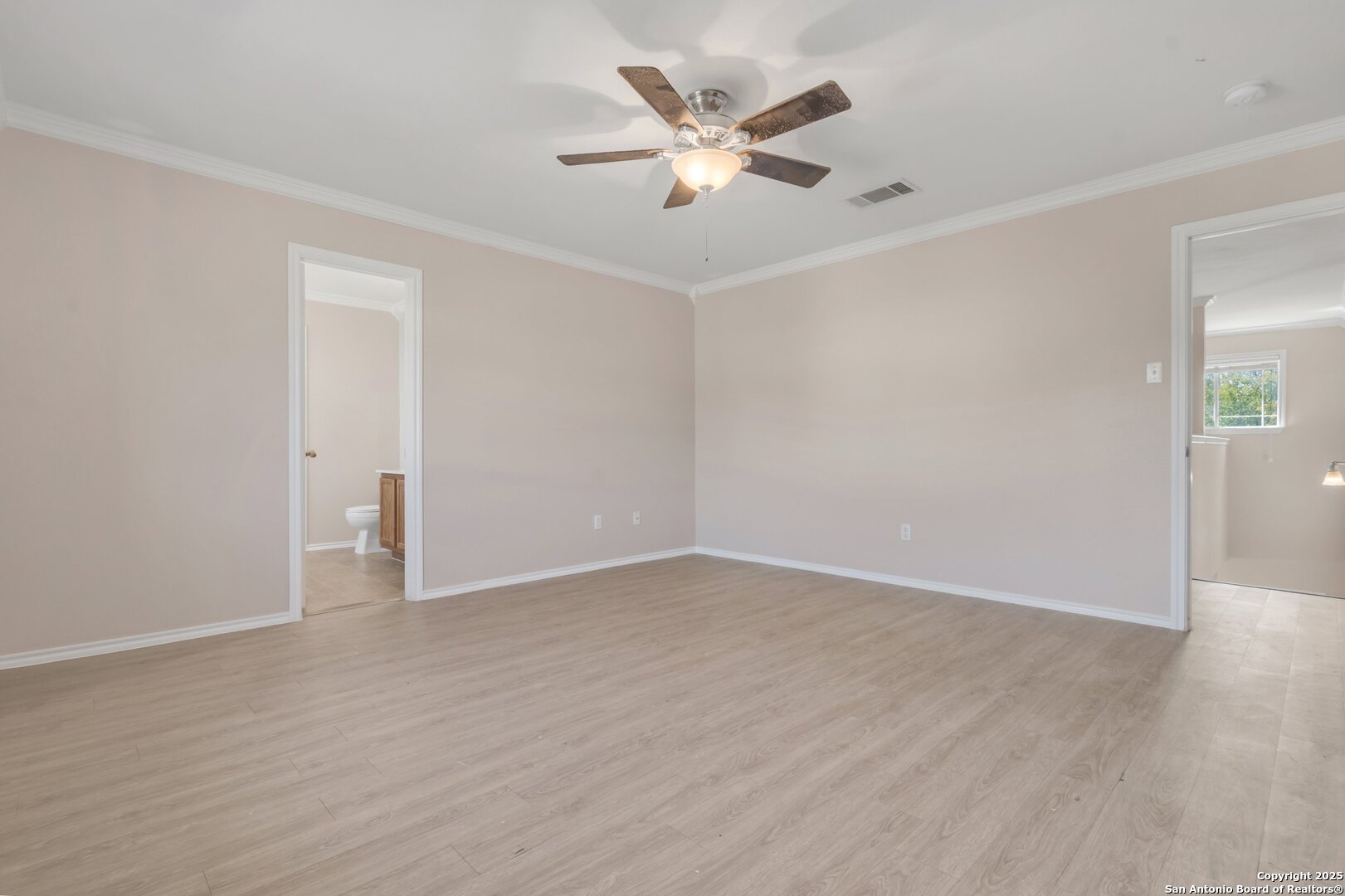 5644 Brougham Way Austin, TX 78754 - Photo 17 of 31 an empty room with wooden floor and ceiling fan
