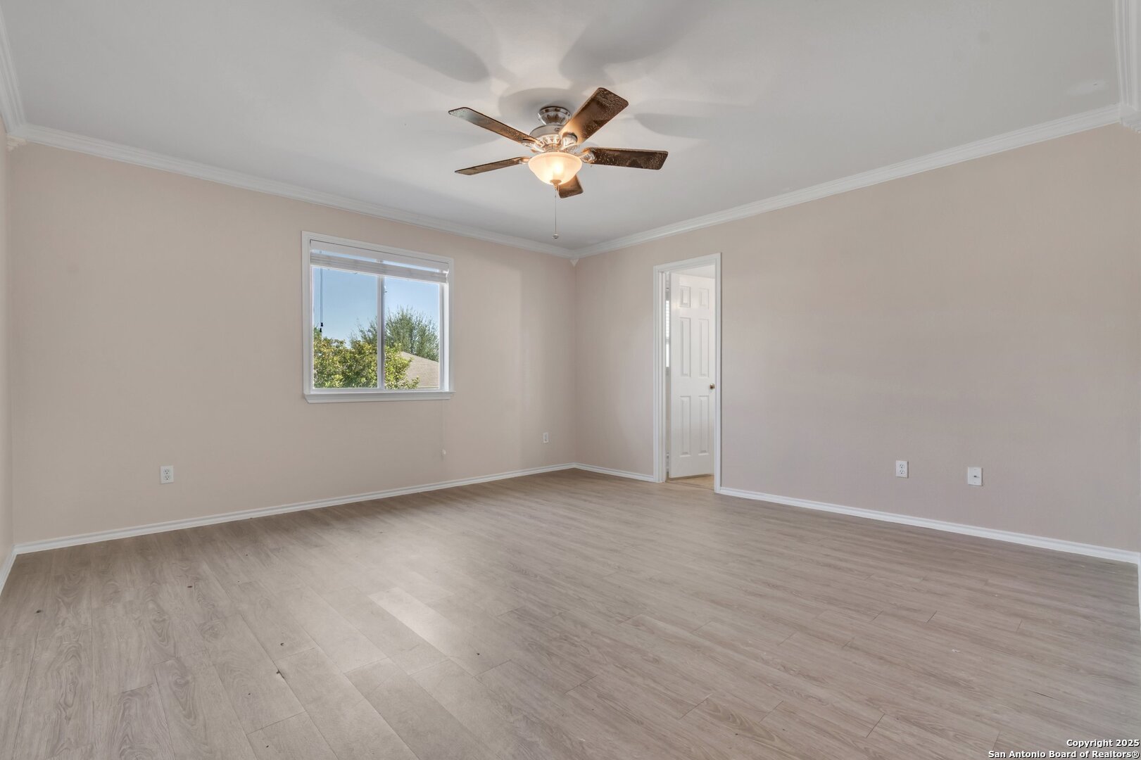 5644 Brougham Way Austin, TX 78754 - Photo 18 of 31 wooden floor in an empty room with a window