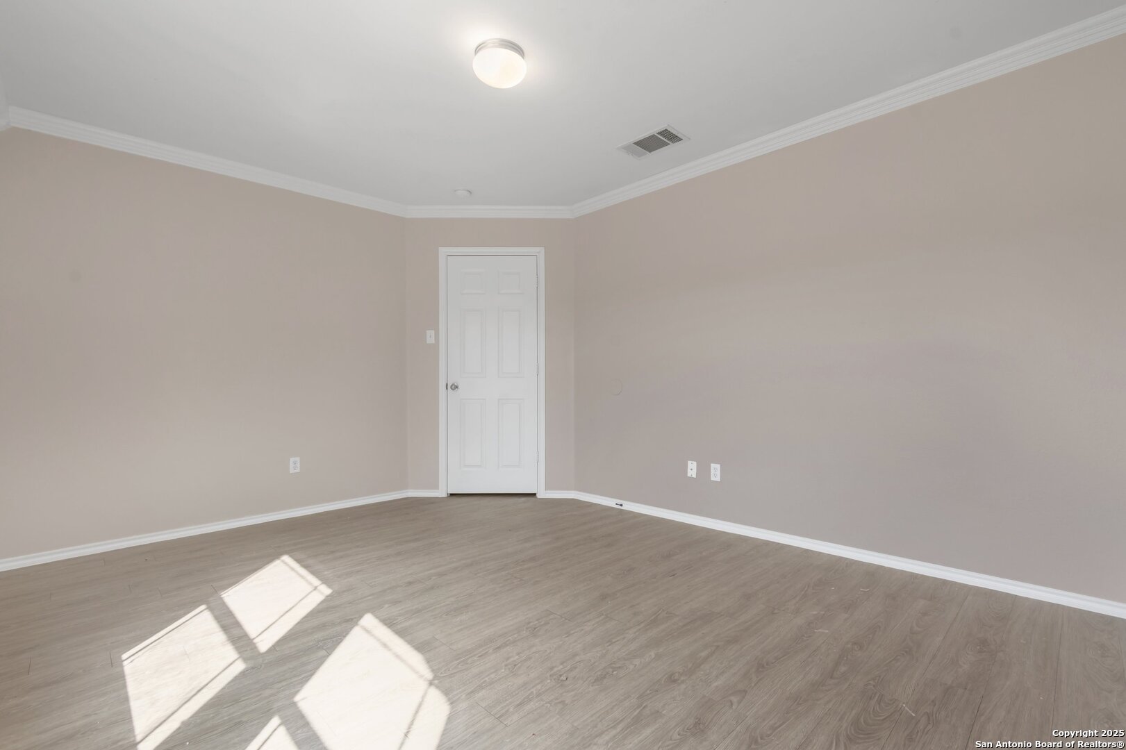 5644 Brougham Way Austin, TX 78754 - Photo 19 of 31 an empty room with wooden floor and windows
