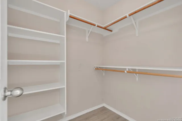 a view of an empty walk in closet