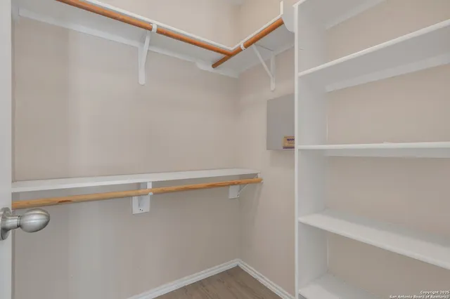 a view of small space with racks on the wall