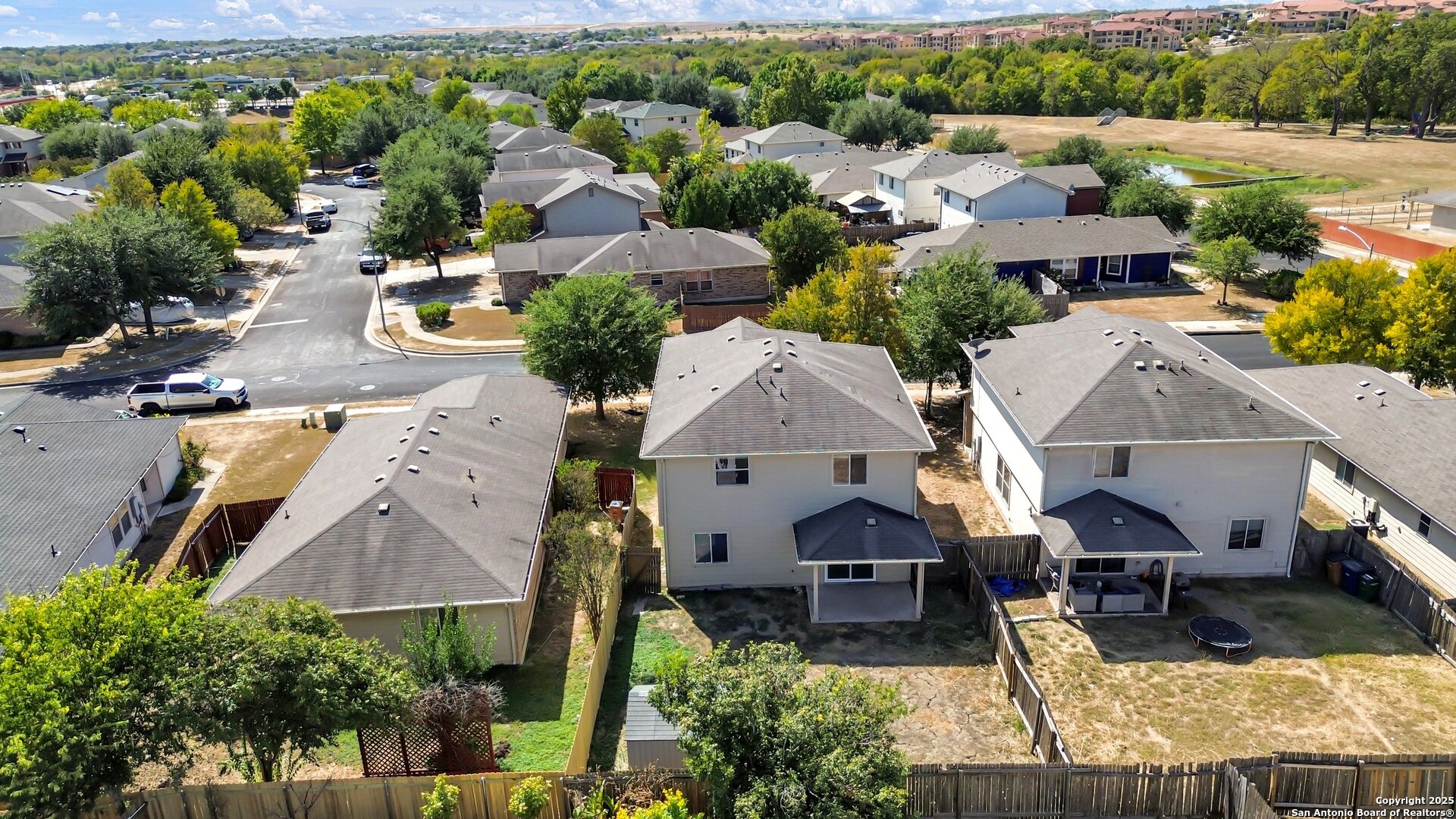 5644 Brougham Way Austin, TX 78754 - Photo 30 of 31 an aerial view of a house with a yard and lake view