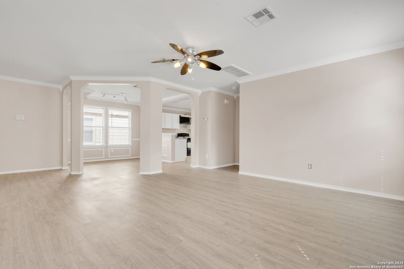 5644 Brougham Way Austin, TX 78754 - Photo 7 of 31 wooden floor in an empty room with a window