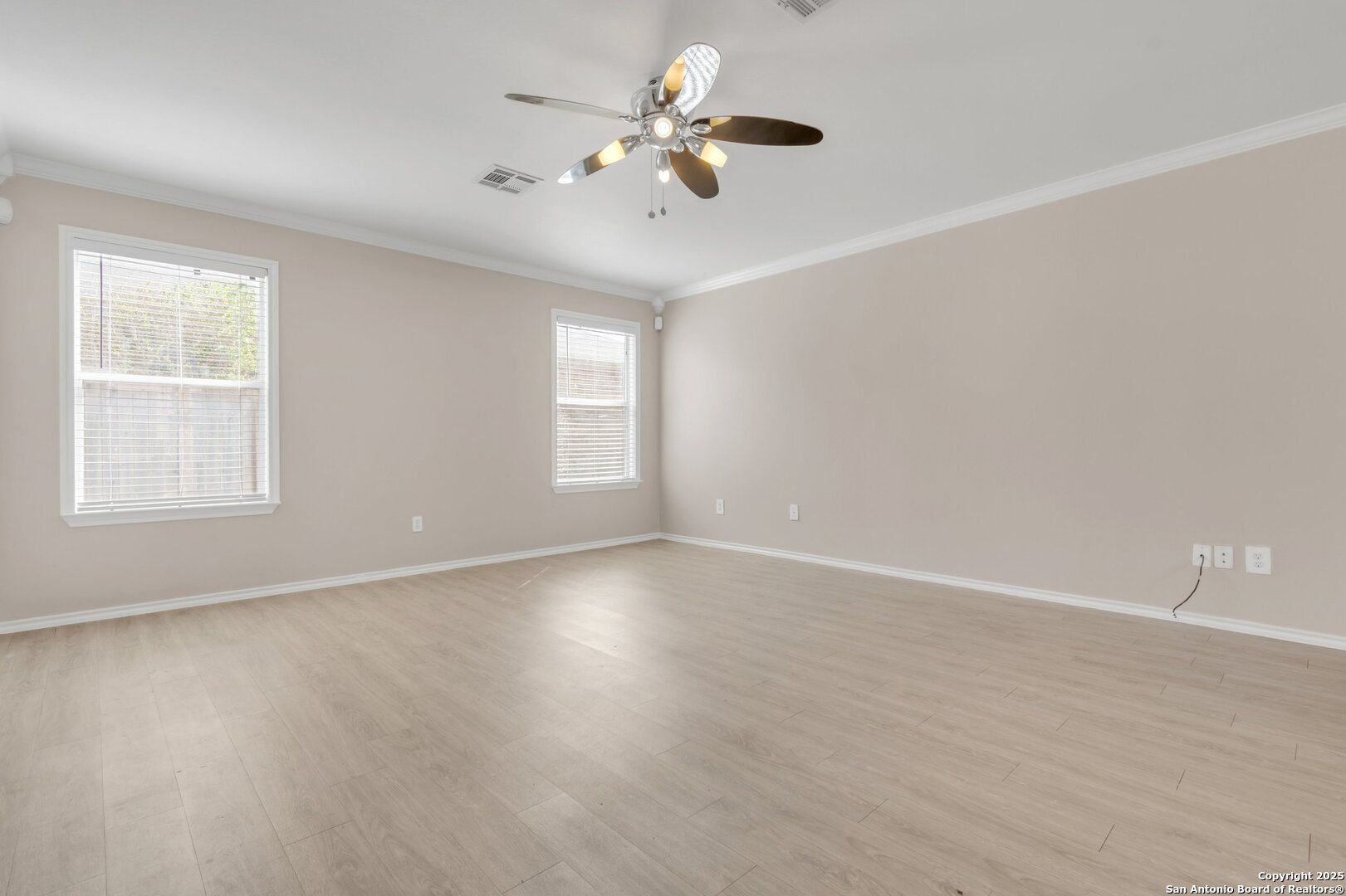 5644 Brougham Way Austin, TX 78754 - Photo 8 of 31 wooden floor in an empty room with a window