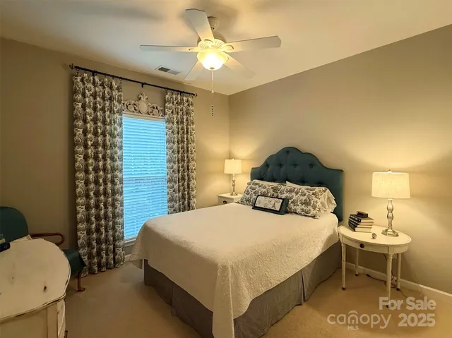 a bathroom with a sink toilet and mirror