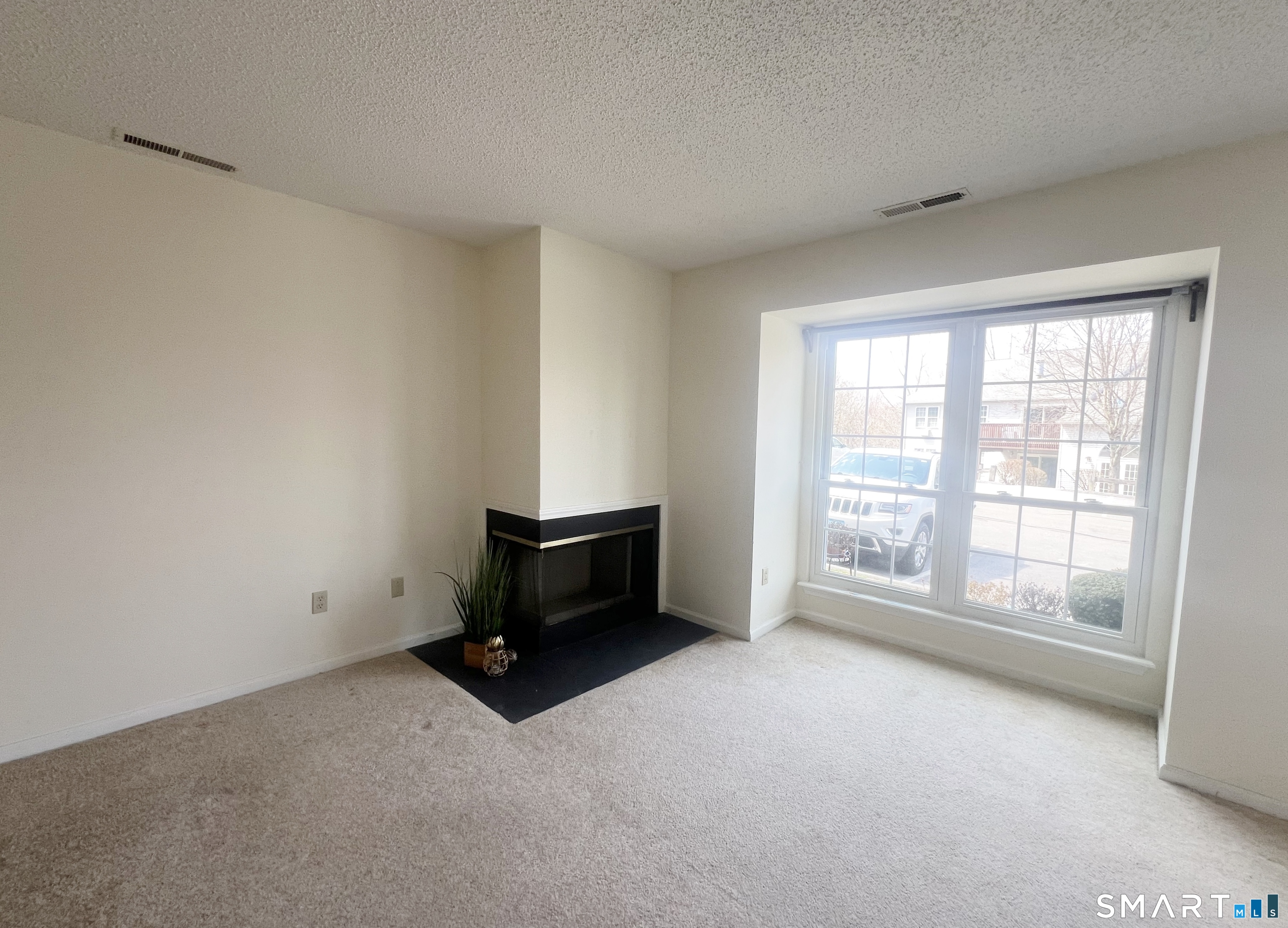 78 Rockledge Loop, Unit 78 Torrington, CT 06790 - Photo 7 of 31 * Wood Burning Fireplace