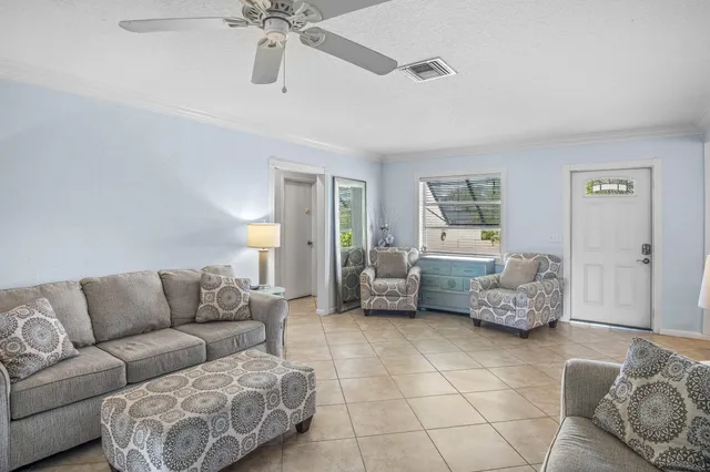 a living room with furniture and a couch