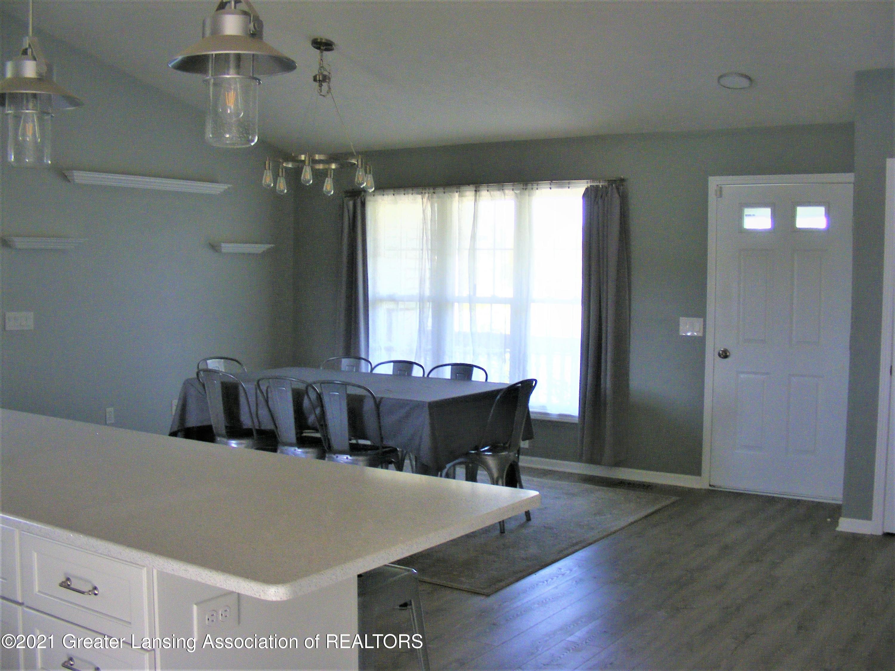 2430 South Meridian Road Ovid, MI 48866 - Photo 7 of 36 Kitchen dining, living area open concept