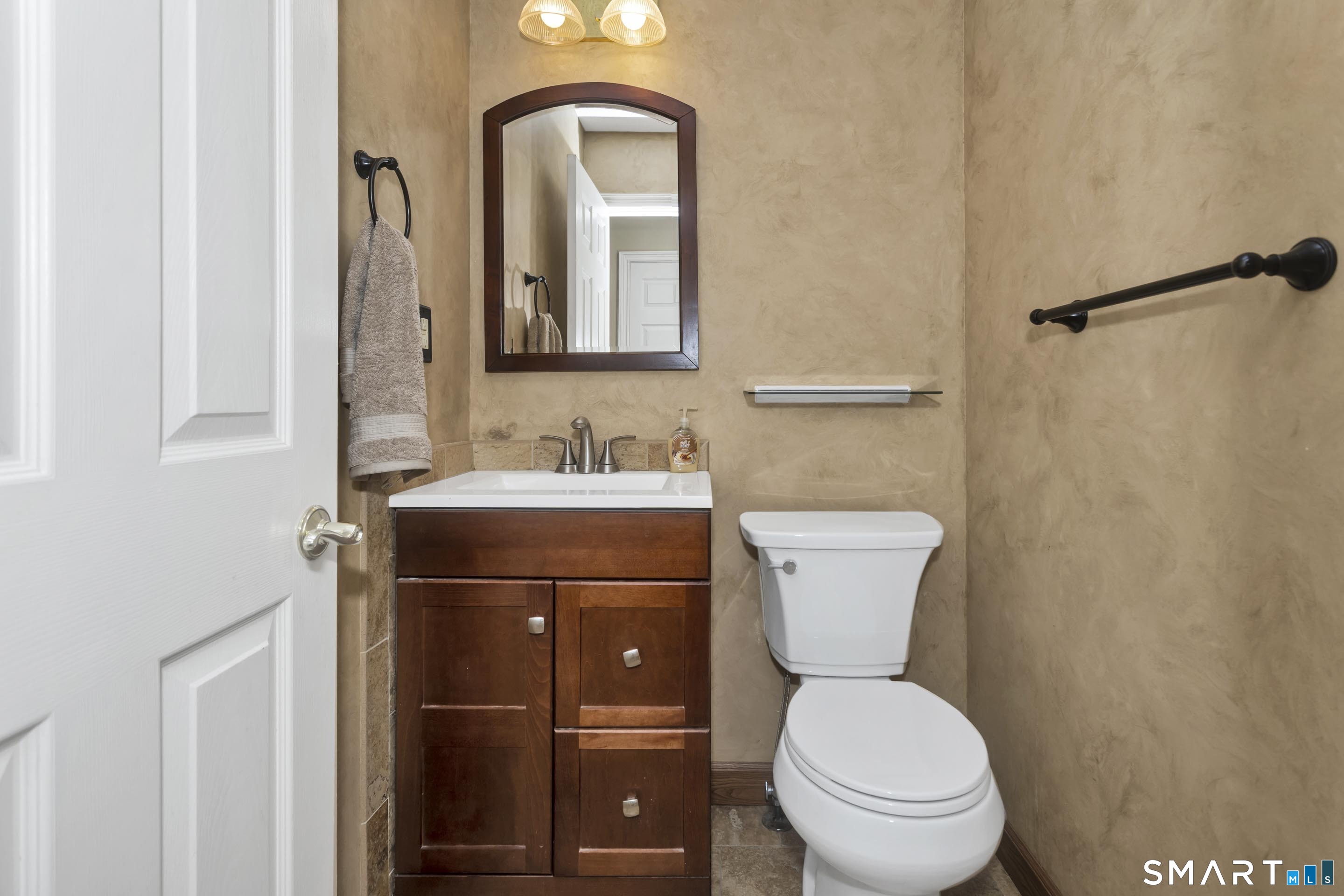 8 Dibble Hollow Lane, Unit 8 Windsor Locks, CT 06096 - Photo 13 of 32 First floor half bathroom