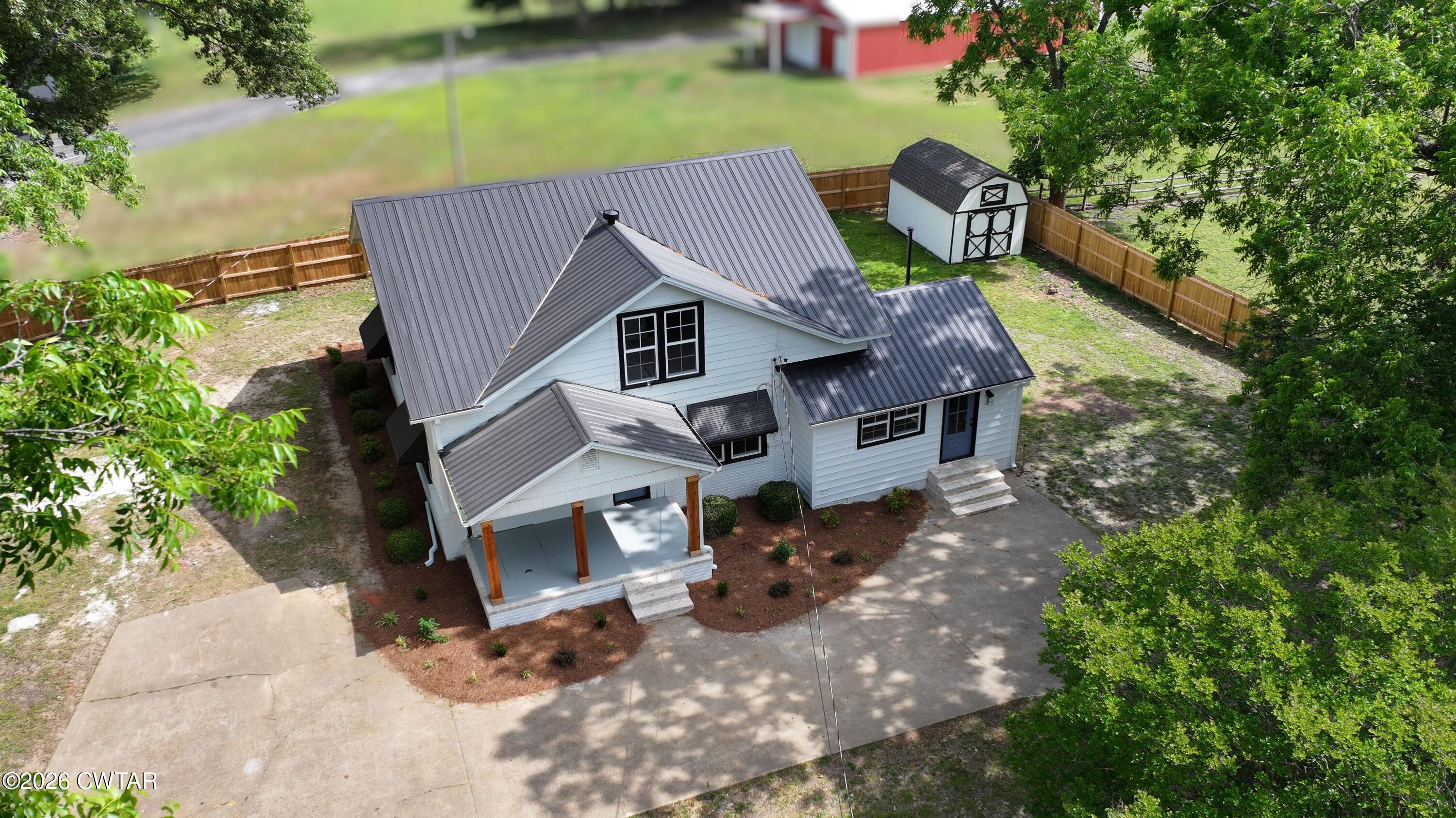 16 Manner Frank Road Milan, TN 38358 - Photo 3 of 25 an aerial view of a house