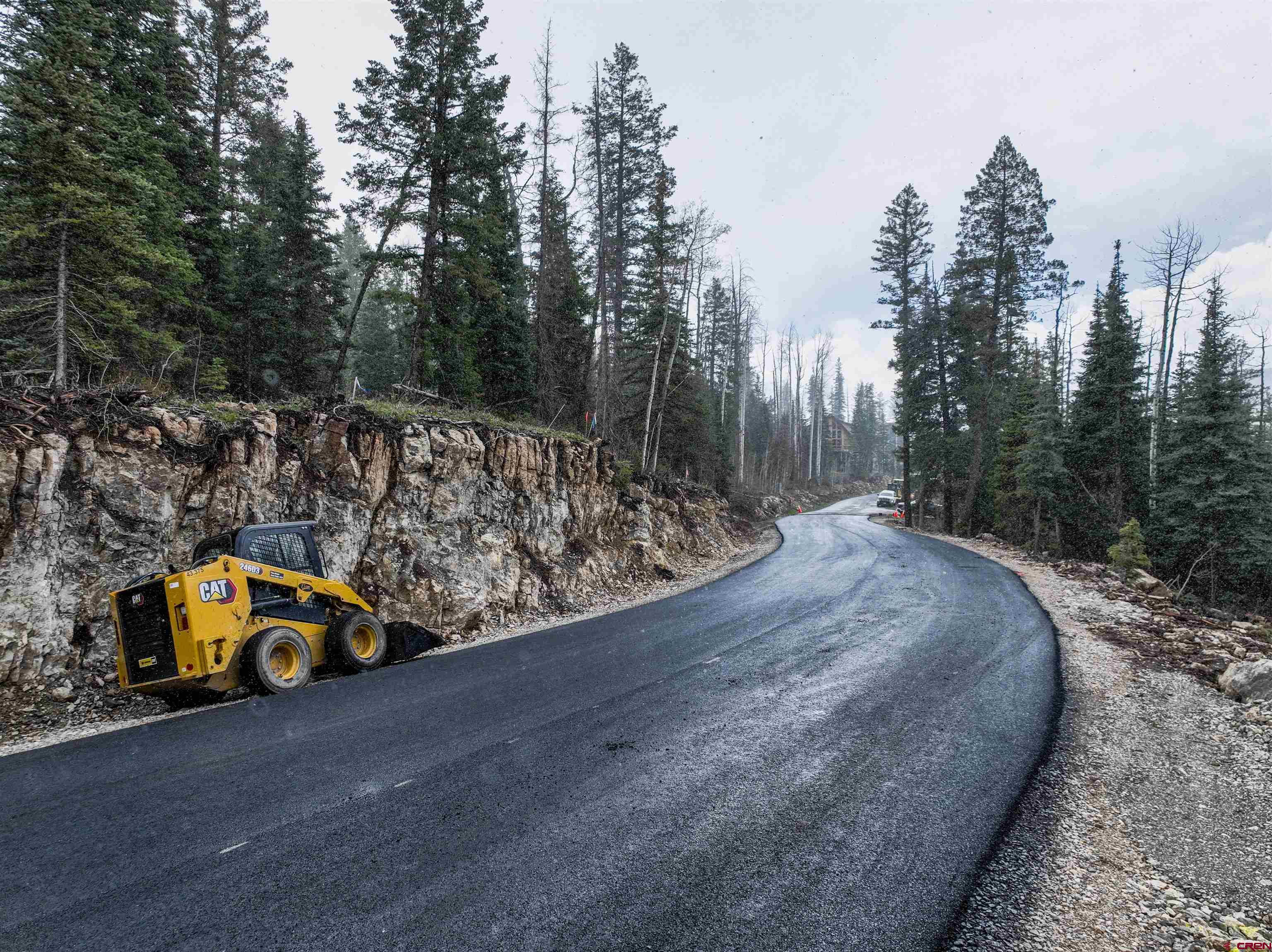 256 Snowden Drive Durango, CO 81301 - Photo 11 of 13 a view of a street with a car parked on the road