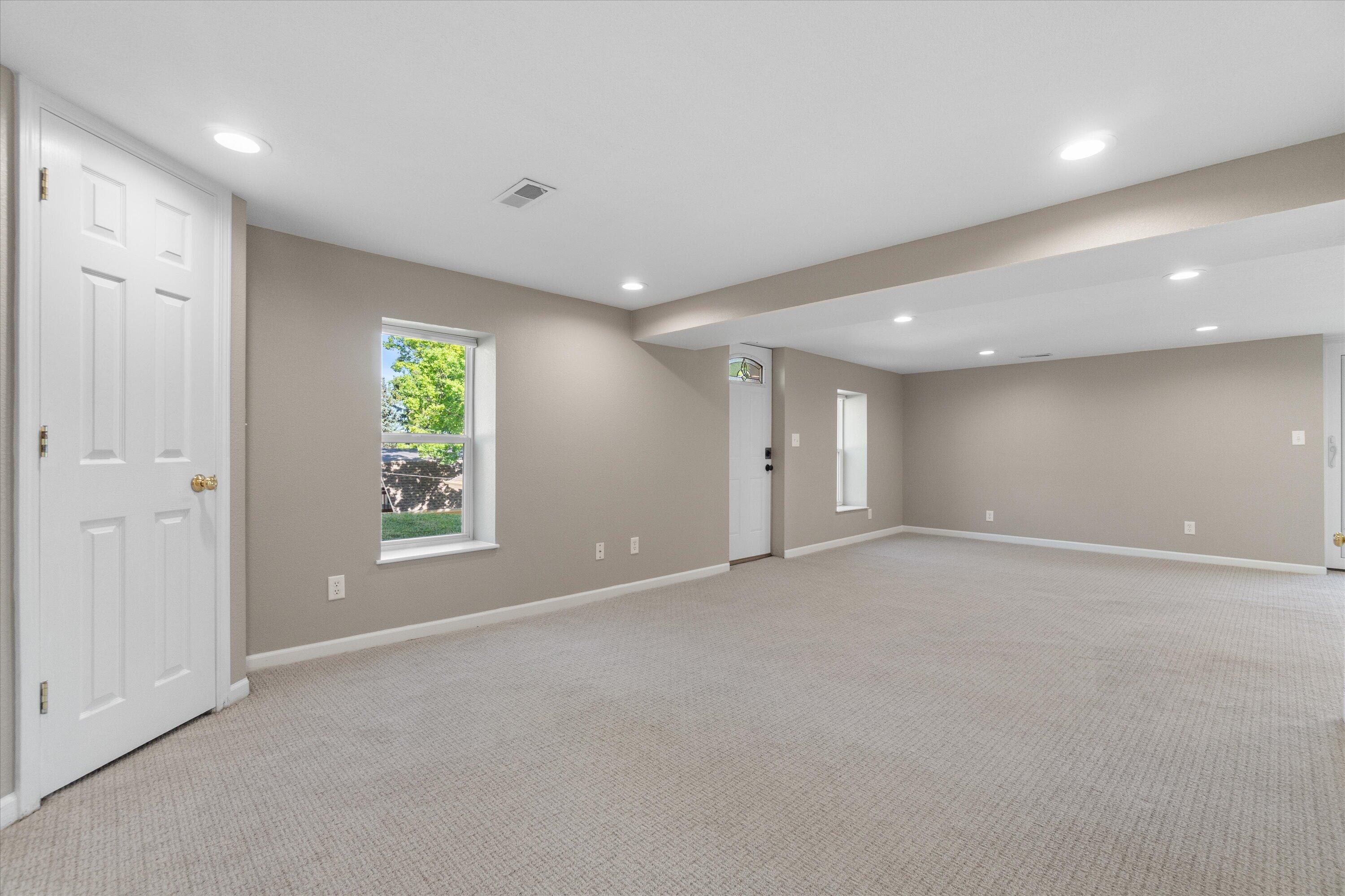 N39W27485 Hillside Grove Road Pewaukee, WI 53072 - Photo 20 of 43 Lower level family room