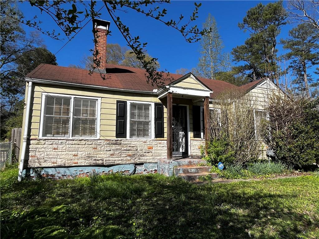 1435 Richland Road Southwest Atlanta, GA 30310 - Photo 1 of 1 a view of a house with garden