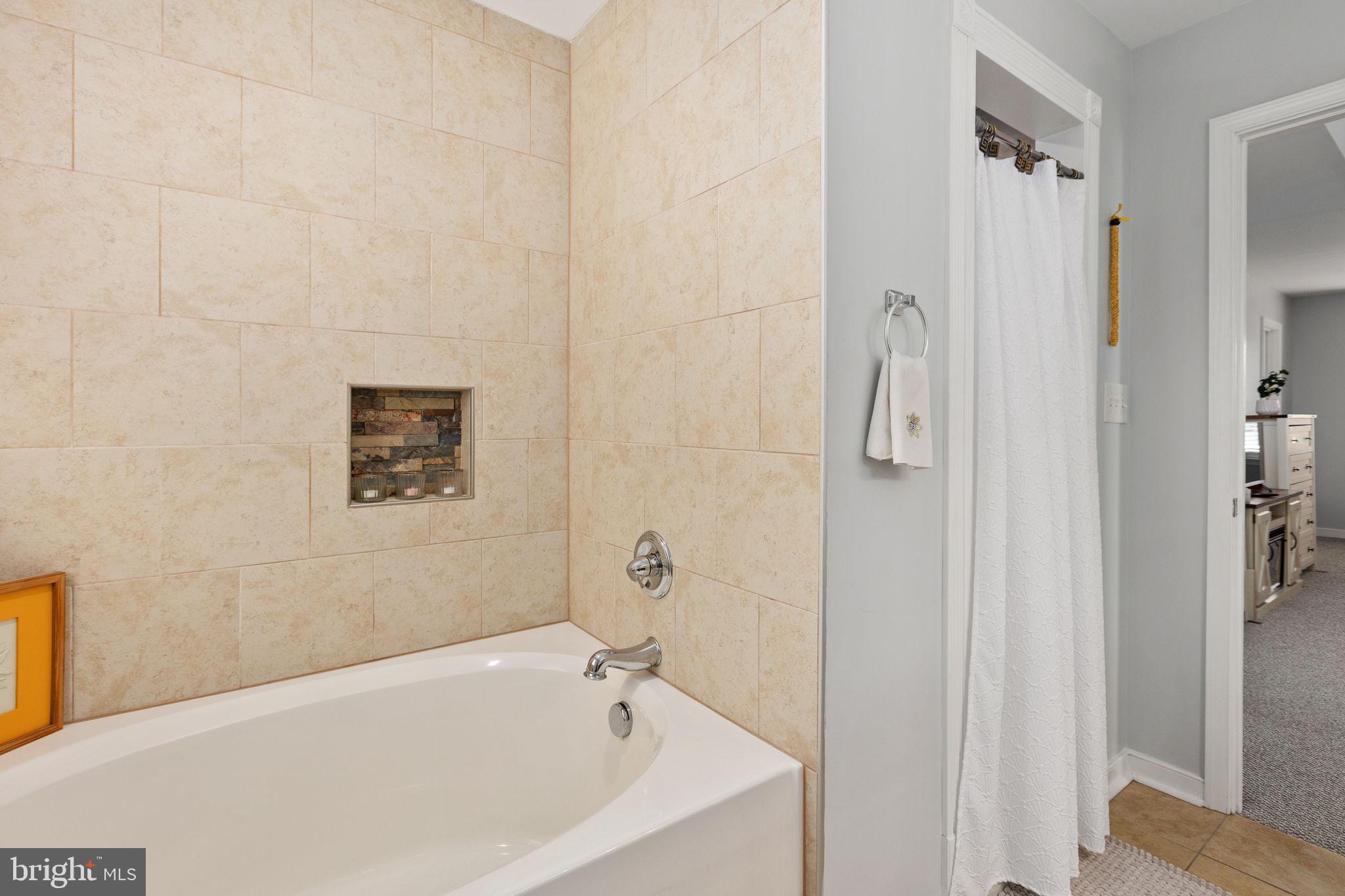 22088 Landora Bridge Road Ruther Glen, VA 22546 - Photo 64 of 122 Serene bath retreat with elegant tiles.