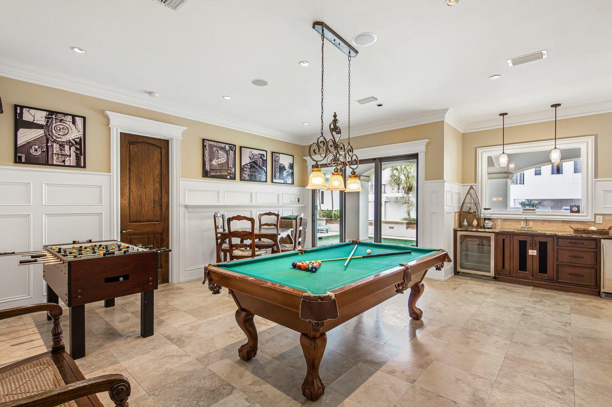 4789 Ocean Boulevard Destin, FL 32541 - Photo 12 of 47 a room with pool table table tennis pool table and windows