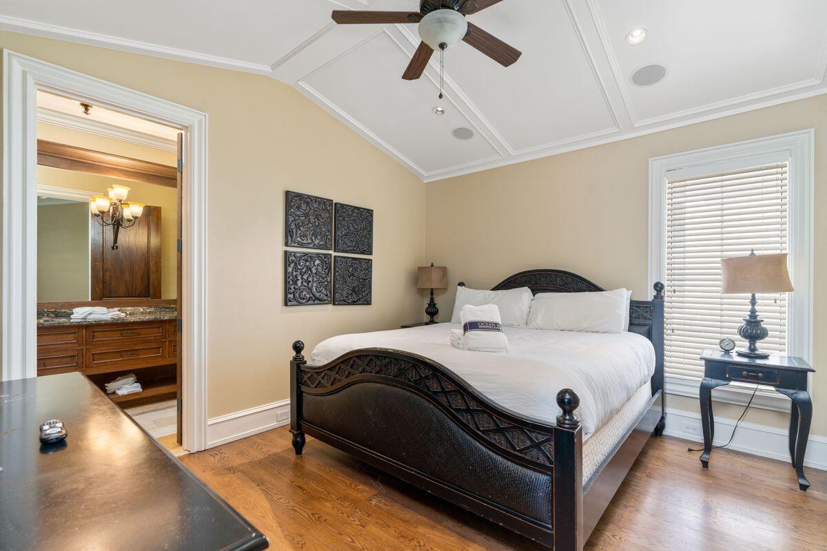 4789 Ocean Boulevard Destin, FL 32541 - Photo 29 of 47 a bedroom with a bed and walk in closet