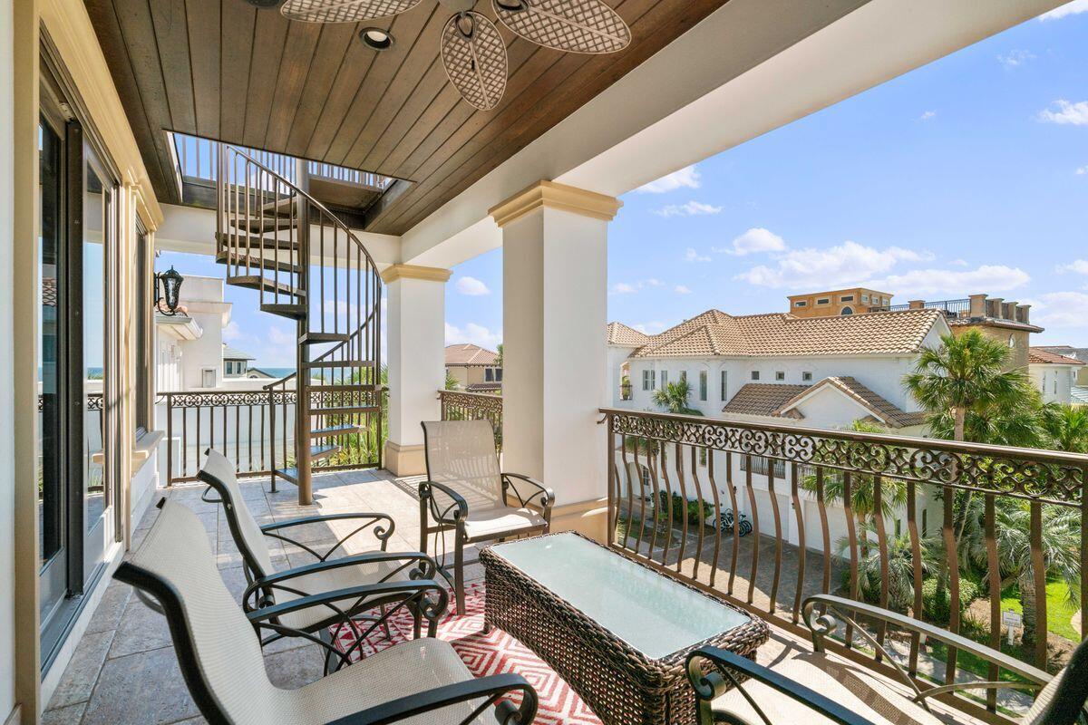 4789 Ocean Boulevard Destin, FL 32541 - Photo 33 of 47 a view of a balcony with furniture