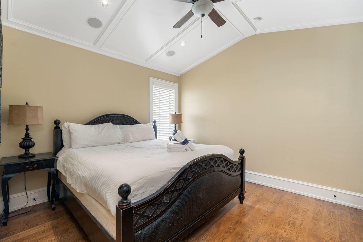 4789 Ocean Boulevard Destin, FL 32541 - Photo 39 of 47 a large bed sitting in a bedroom next to a window