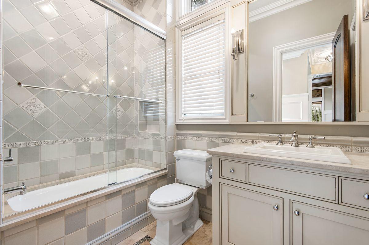 4789 Ocean Boulevard Destin, FL 32541 - Photo 41 of 47 a bathroom with a sink toilet and shower