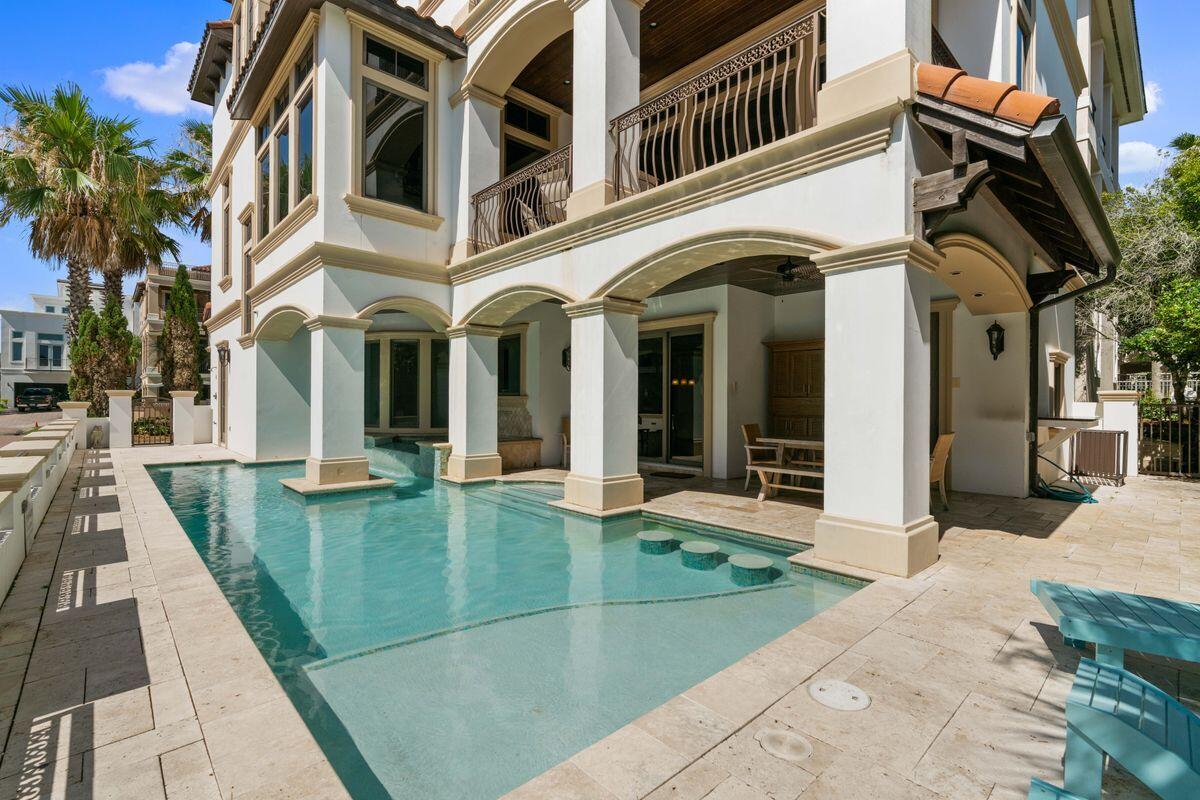4789 Ocean Boulevard Destin, FL 32541 - Photo 7 of 47 a view of a building with a outdoor space