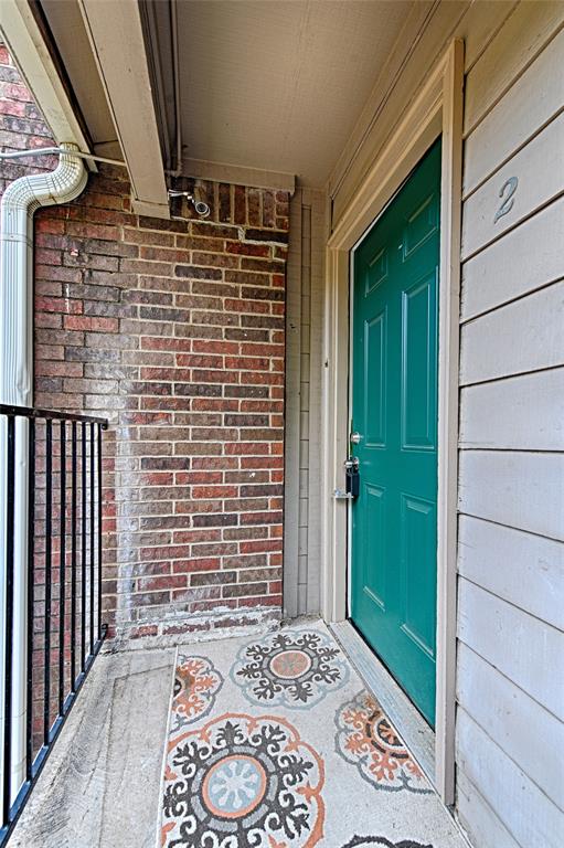 8545 Midpark Road, Unit 2 Dallas, TX 75240 - Photo 3 of 19 a view of front door of house