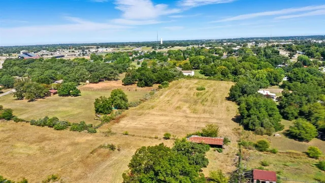 a view of a lake with a city
