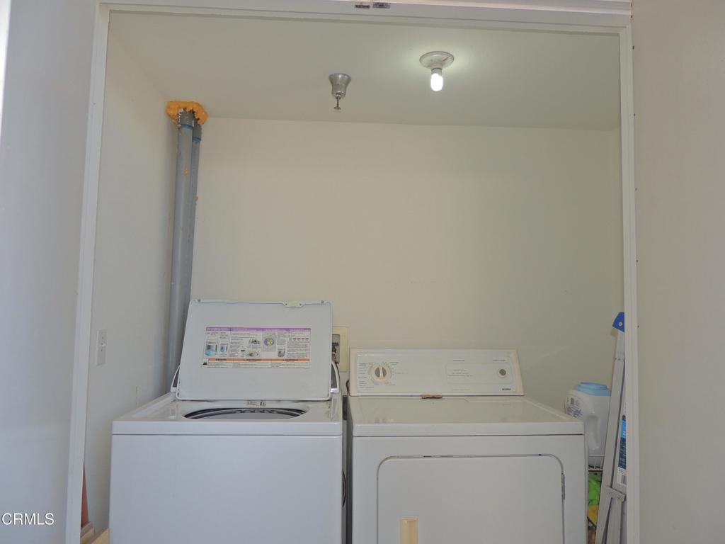 865 South B Street, Unit L2 Oxnard, CA 93030 - Photo 12 of 32 a utility room with dryer and washer