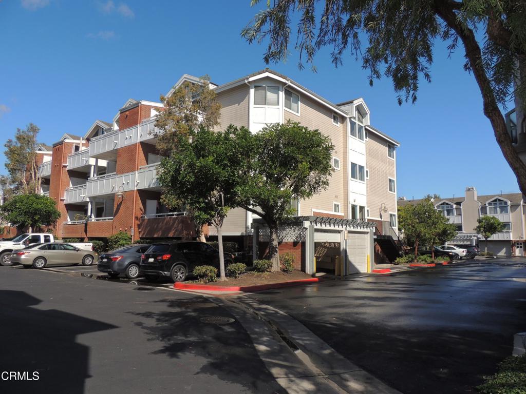 865 South B Street, Unit L2 Oxnard, CA 93030 - Photo 14 of 32 a front view of a building with street view