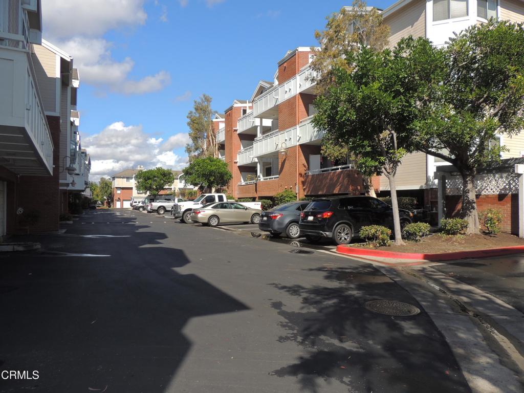 865 South B Street, Unit L2 Oxnard, CA 93030 - Photo 15 of 32 a view of a street with cars