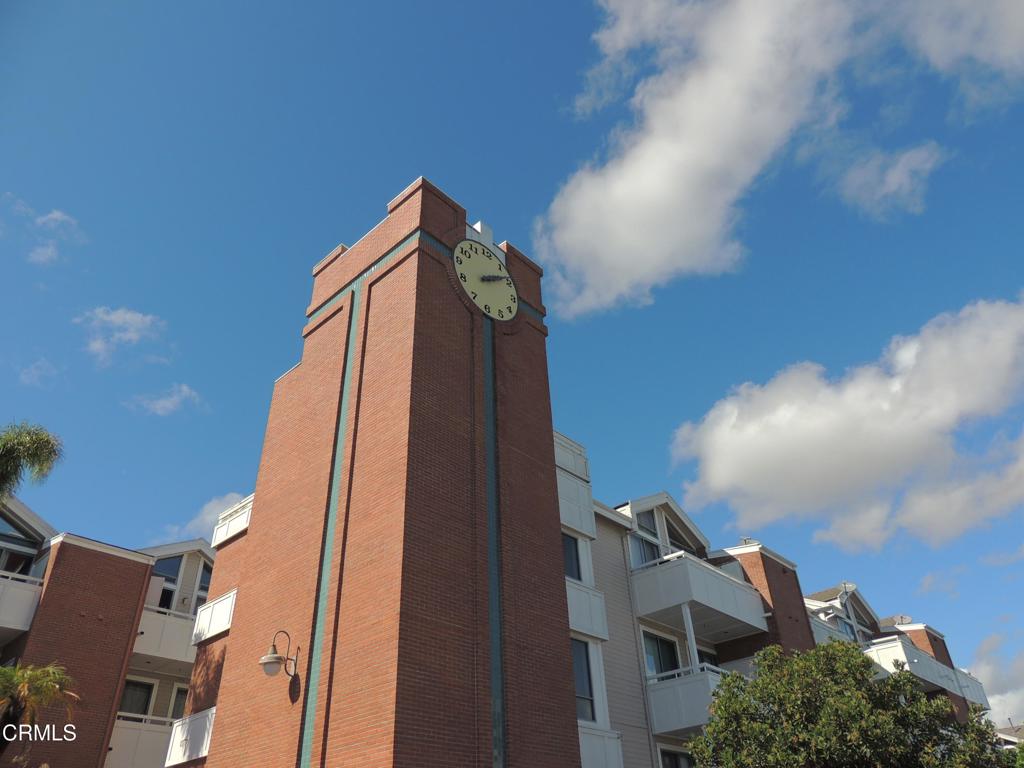 865 South B Street, Unit L2 Oxnard, CA 93030 - Photo 30 of 32 a view of a tall brick building