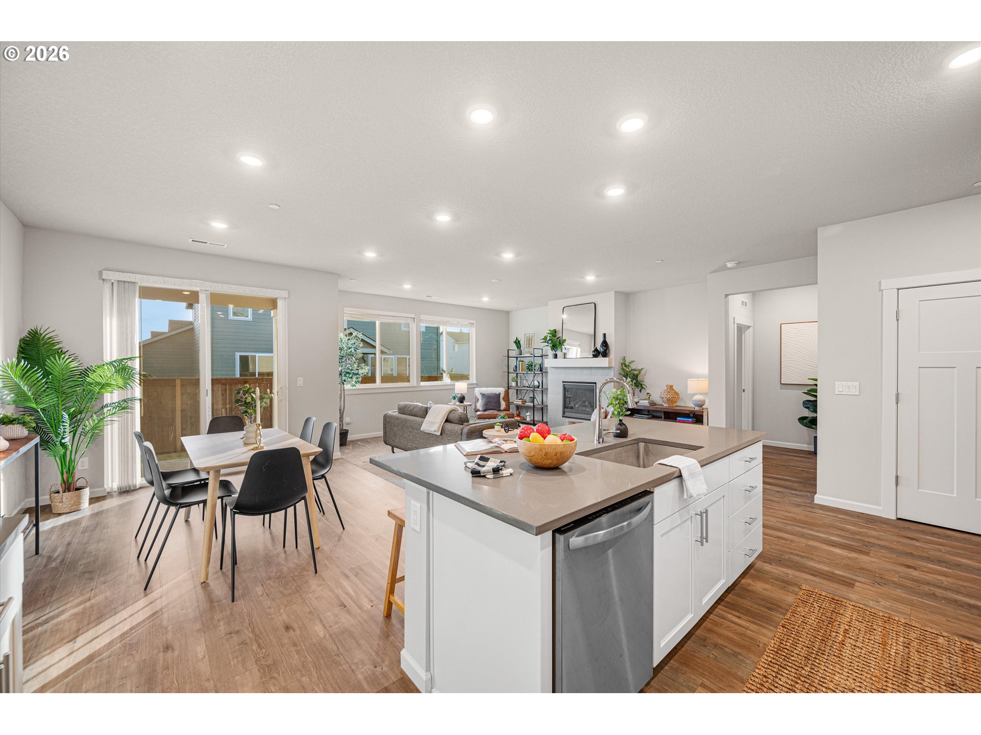 2637 South 6th Way Ridgefield, WA 98642 - Photo 16 of 41 a kitchen with a counter top space a sink appliances and cabinets